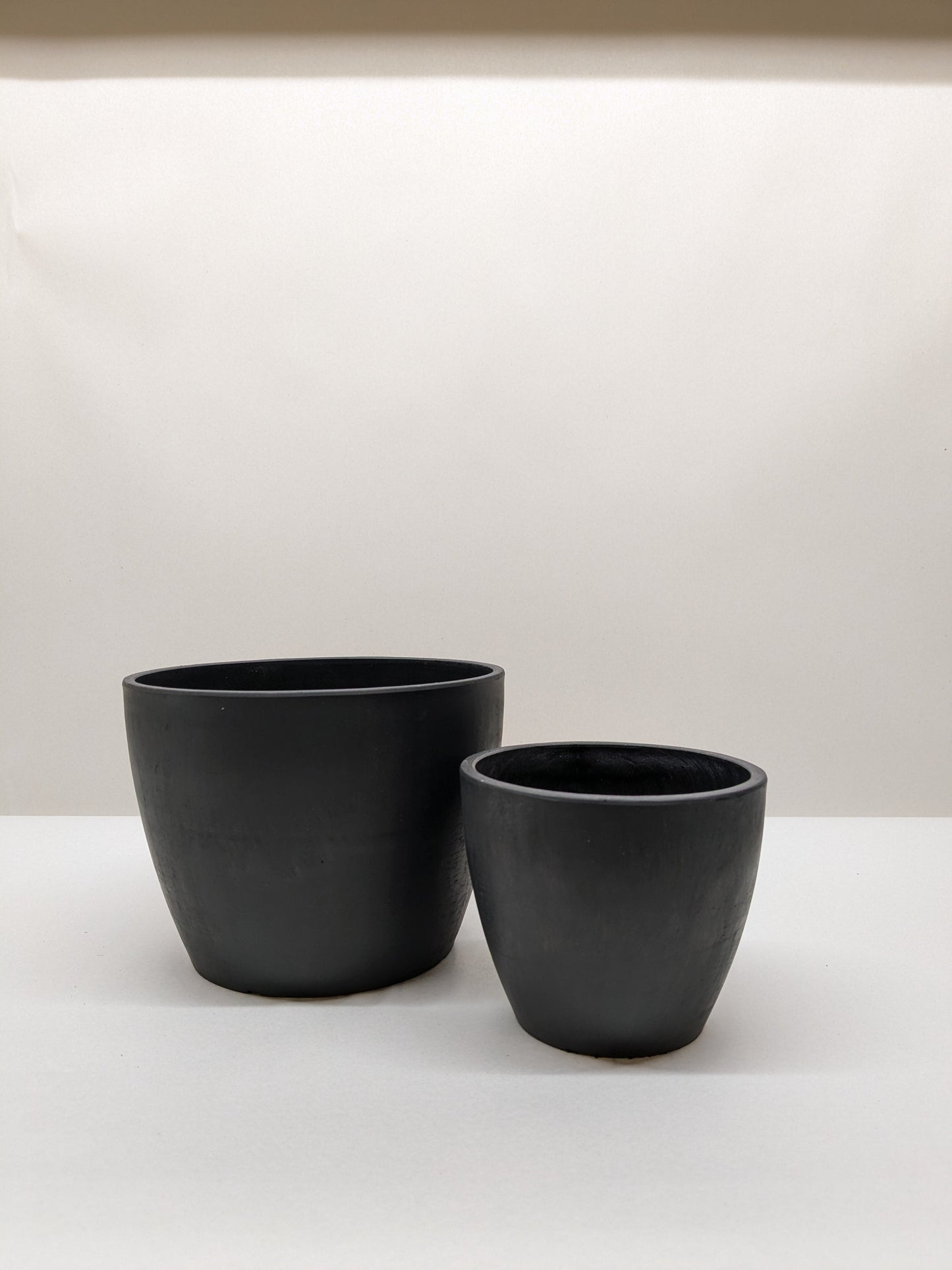 Black and Terra Cotta Eco Pots